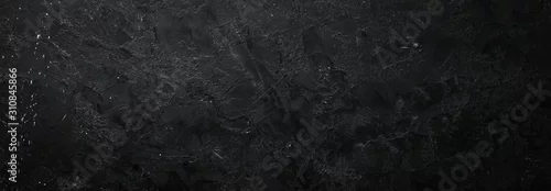 Obraz  z motywem Black stone background. Stone texture. Top view. Free space for your text.