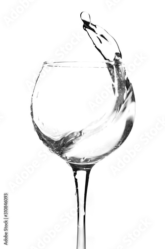 wine glass splashing water on a white background