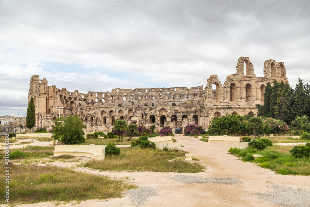 Old antique amazing well conserved huge Amphitheatre of El Jem in Tunisia. Horizontal color photography.