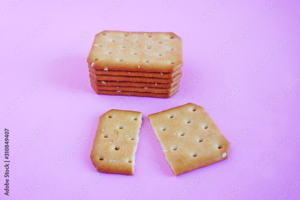 Cracker bread isolated on the pink scene or pink background Cracker bread isolated on the pink scene or pink background