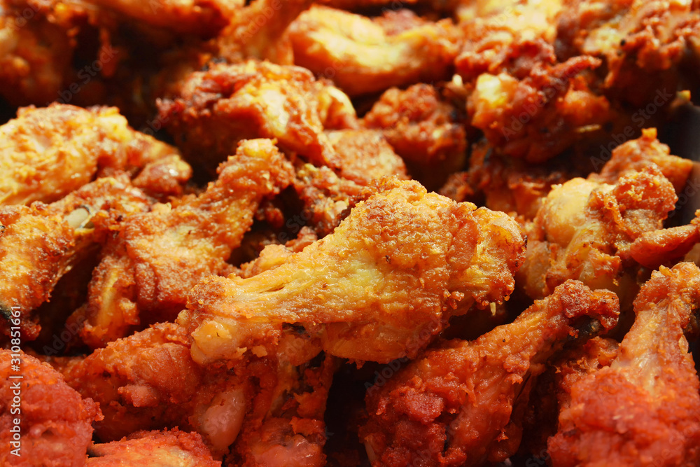 Fried chicken wing or Fried chicken on a plate in thai food style Fried chicken wing or Fried chicken on a plate in thai food style