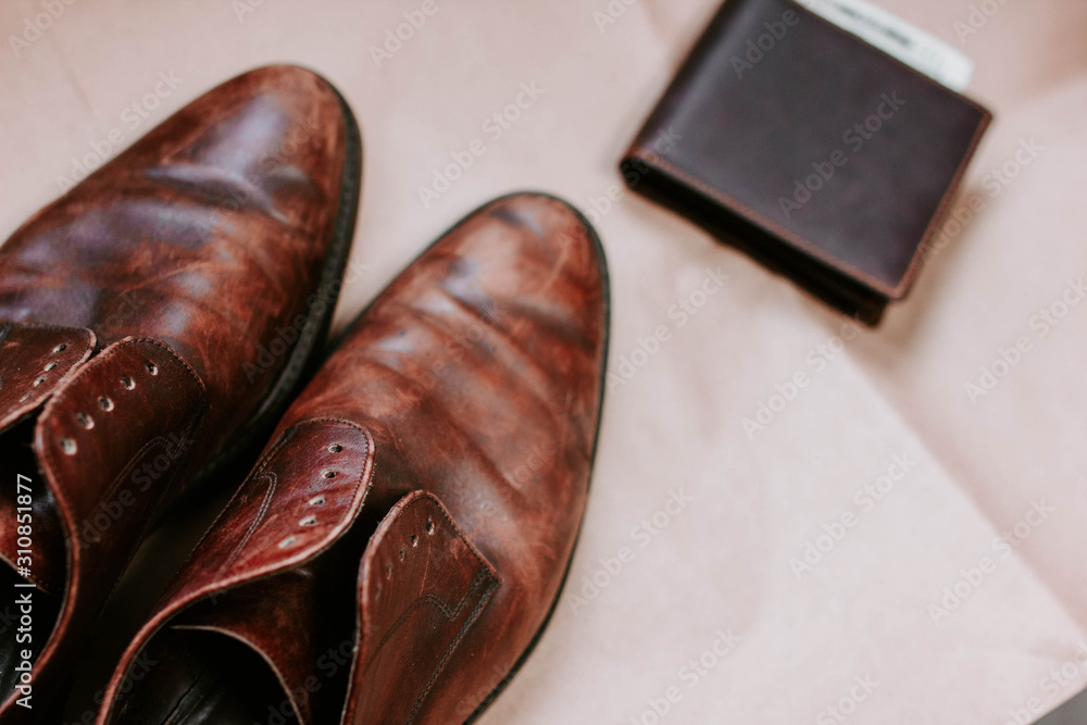 brown retro leather shoes and wallet. brown retro leather shoes and wallet.
