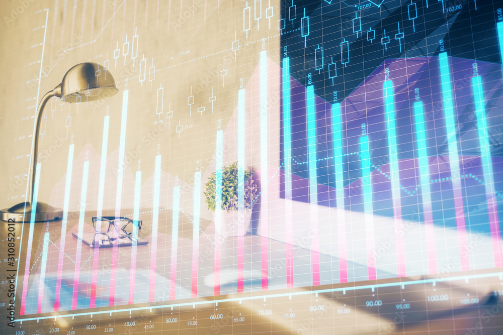 Forex market chart hologram and personal computer background. Multi exposure. Concept of investment. Forex market chart hologram and personal computer background. Multi exposure. Concept of investment.