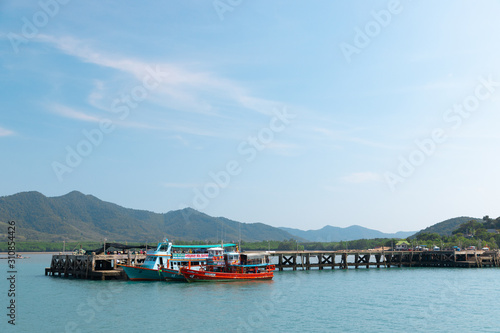 Phang Nga - Thailand, 9 December 2019 : Thai boat port of tourist ship and fisherman ship near the bridge on the island