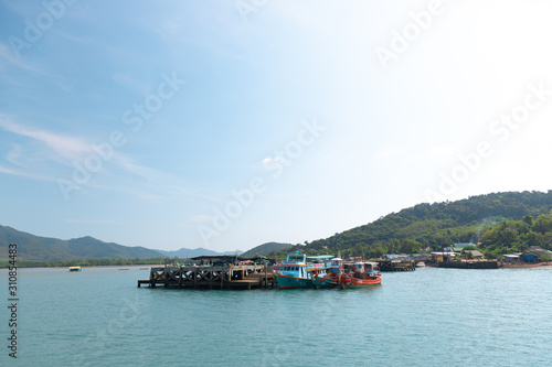 Phang Nga - Thailand, 9 December 2019 : Thai boat port of tourist ship and fisherman ship near the bridge on the island