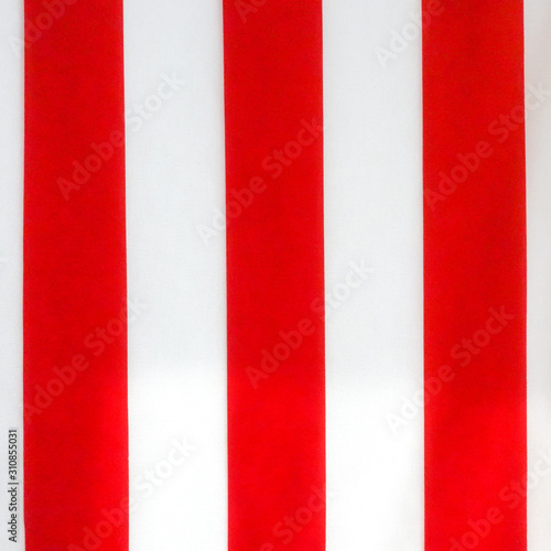 Red and White fabric texture with diagonal stripes. Close up