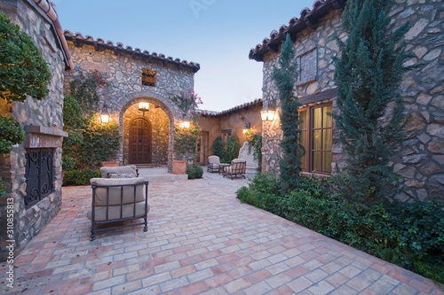 Houses With Chairs In Courtyard