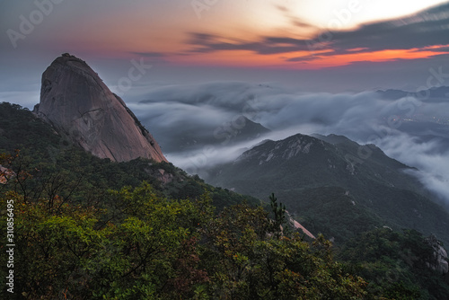 Sunrise at Baegundae peak and Bukhansan mountains in Seoul,South Korea...