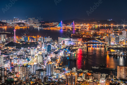 Busan city skylight and Busan tower at night in Korea. © Atakorn