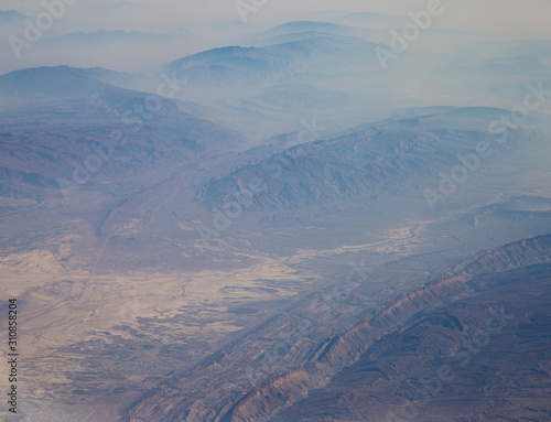 Aerophotography of the rocky mountains from the airplane
