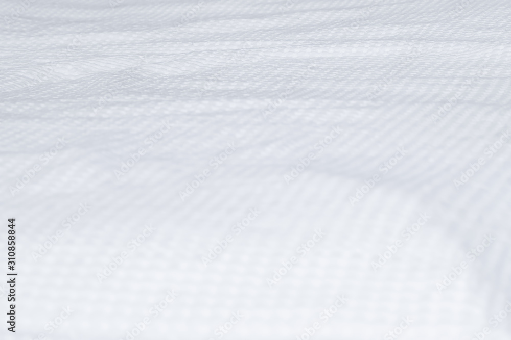 textured white bedding on the bed, prepared for bed, pillows textured white bedding on the bed, prepared for bed, pillows