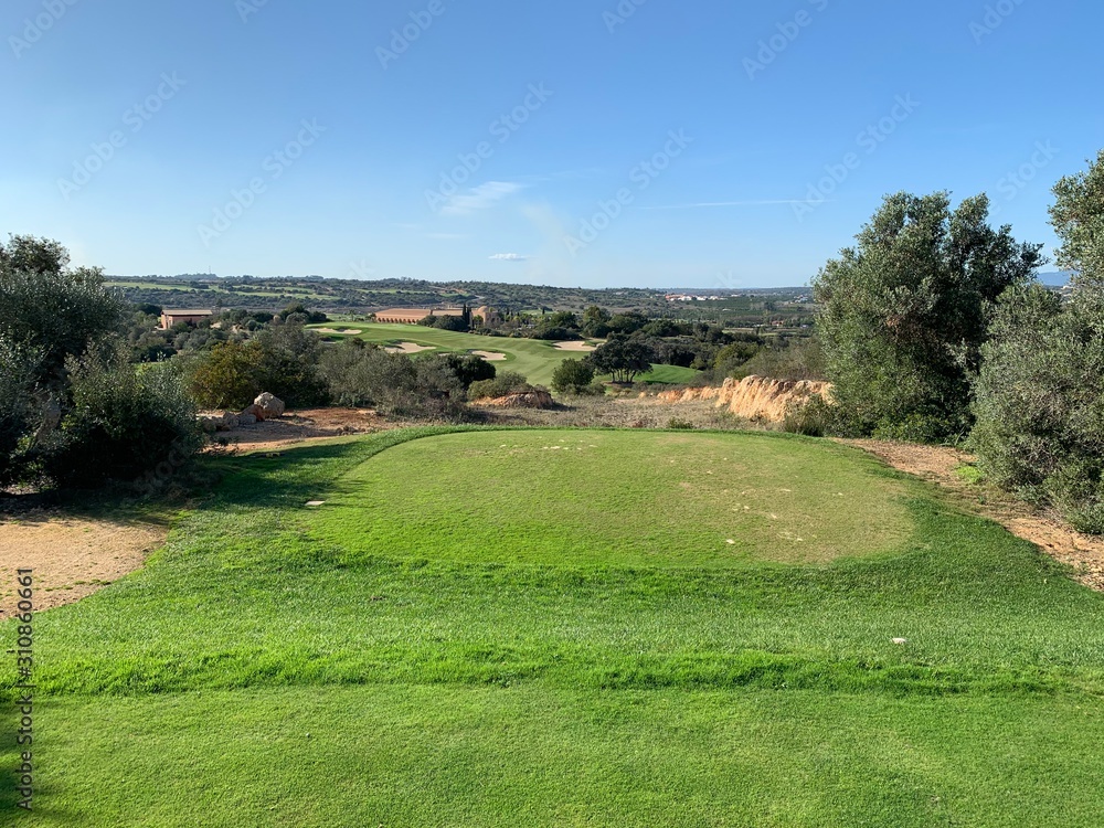 raised view of golf fairway from tee box