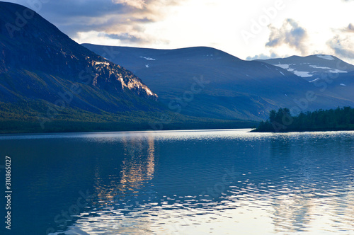 Big clouds over the biggest swedish mountains, kebnekaise valley in Sweden near Nikkaluokta