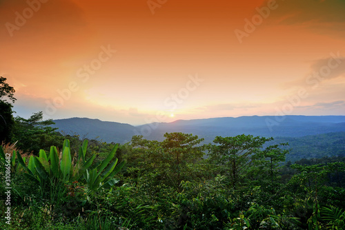 Landscape of mountain hill and orange sky © njmucc