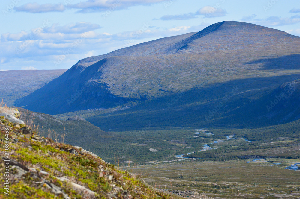 Hiking and backpacking in the valley of the highest Swedish mountains. Nikkaluoakta and Kebnekaise valley