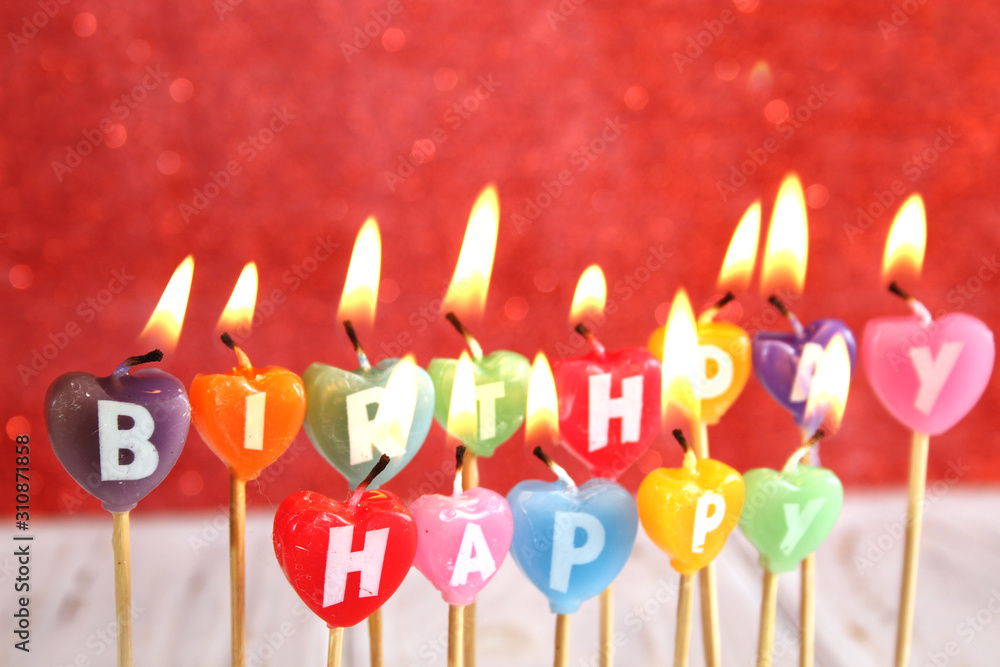 Multi-colored candles with texts Happy Birthday Multi-colored candles with texts Happy Birthday