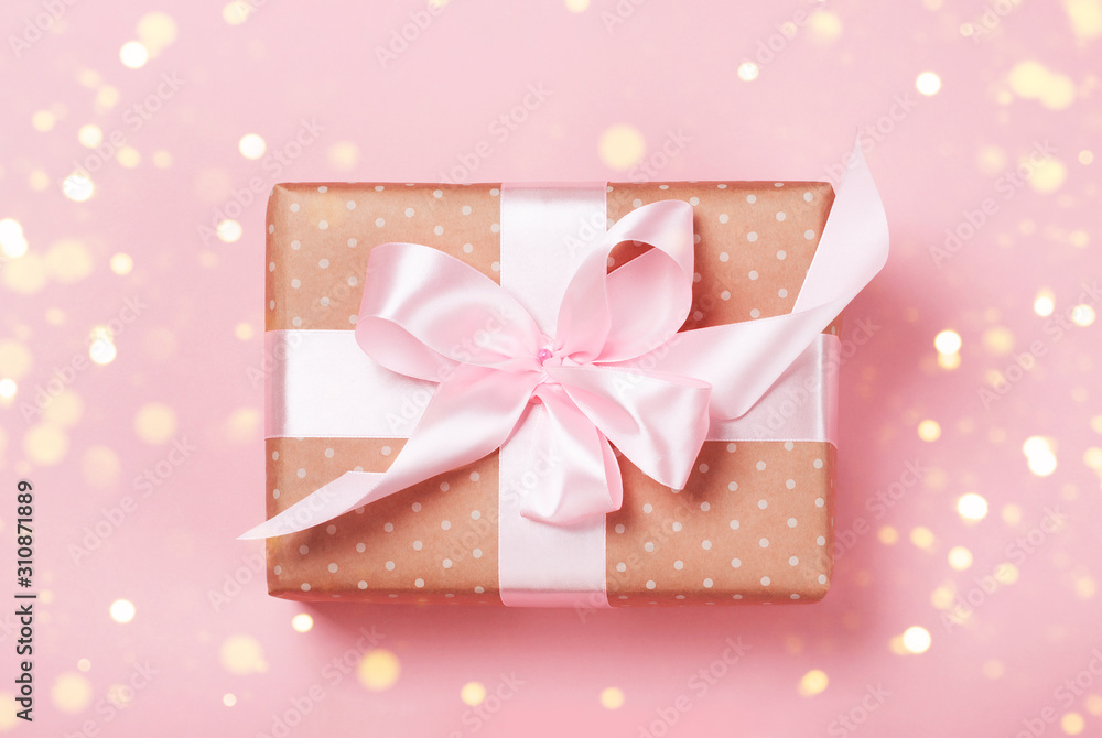 Luxurious gift on a trendy pink colors. Present for St. Valentine's day, weddings, engagements, Mother's Day, birthday, New Year, Christmas, holidays Luxurious gift on a trendy pink colors. Present for St. Valentine's day, weddings, engagements, Mother's Day, birthday, New Year, Christmas, holidays