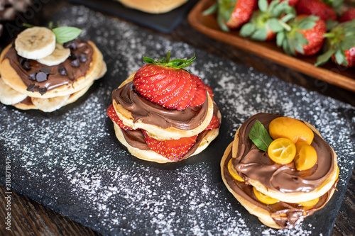 Pancakes with banana, strawberry and chocolate for shrove tuesday