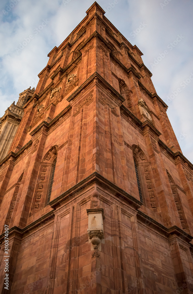 Red stone tower of a church
