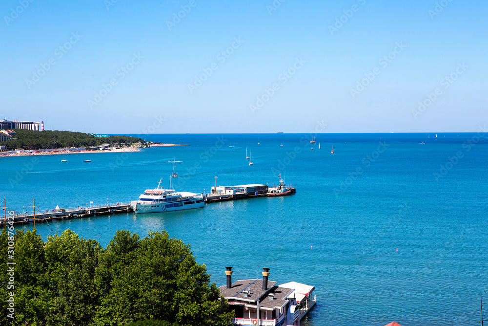 Panorama of the resort of Gelendzhik, the Black sea. Gelendzhik Bay. sea pier with standing pleasure ships and yachts. 