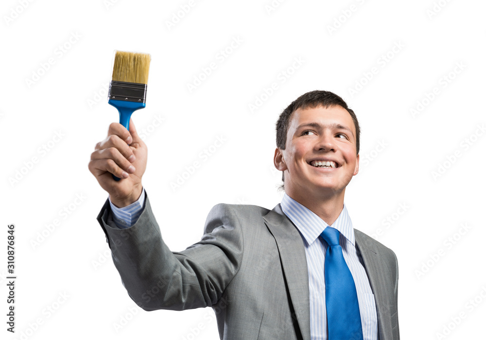 Creative businessman painter holding paintbrush Creative businessman painter holding paintbrush