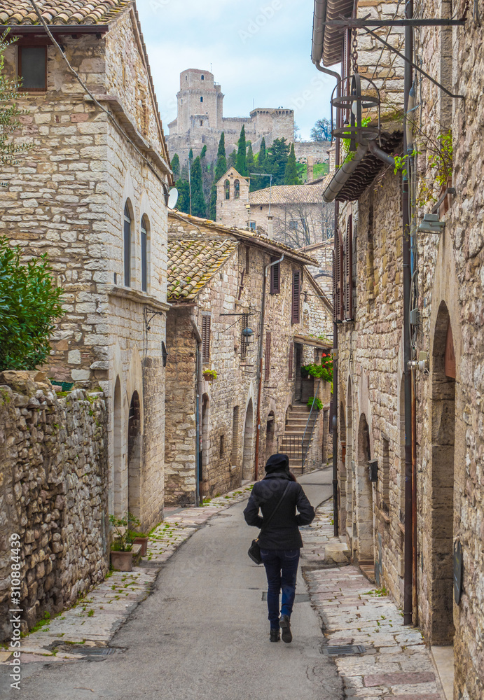 Assisi, Umbria (Italy) - The awesome medieval stone town in Umbria region, with the famous Saint Francis sanctuary, during Christmas holidays. Assisi, Umbria (Italy) - The awesome medieval stone town in Umbria region, with the famous Saint Francis sanctuary, during Christmas holidays.