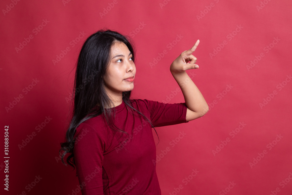 Asian woman touching the screen with finger. Asian woman touching the screen with finger.