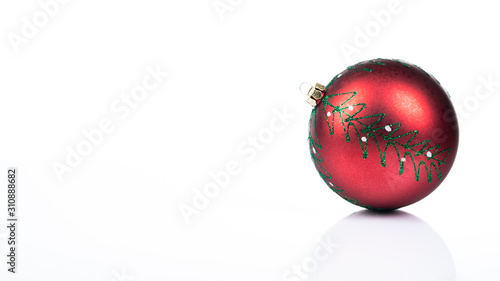 Red christmas ornament on white background