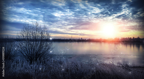 Winter landscape, landscape with a river and sunny sunset. Natural background, winter background.