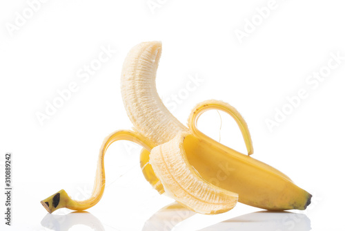 yellow and ripe banana on white background