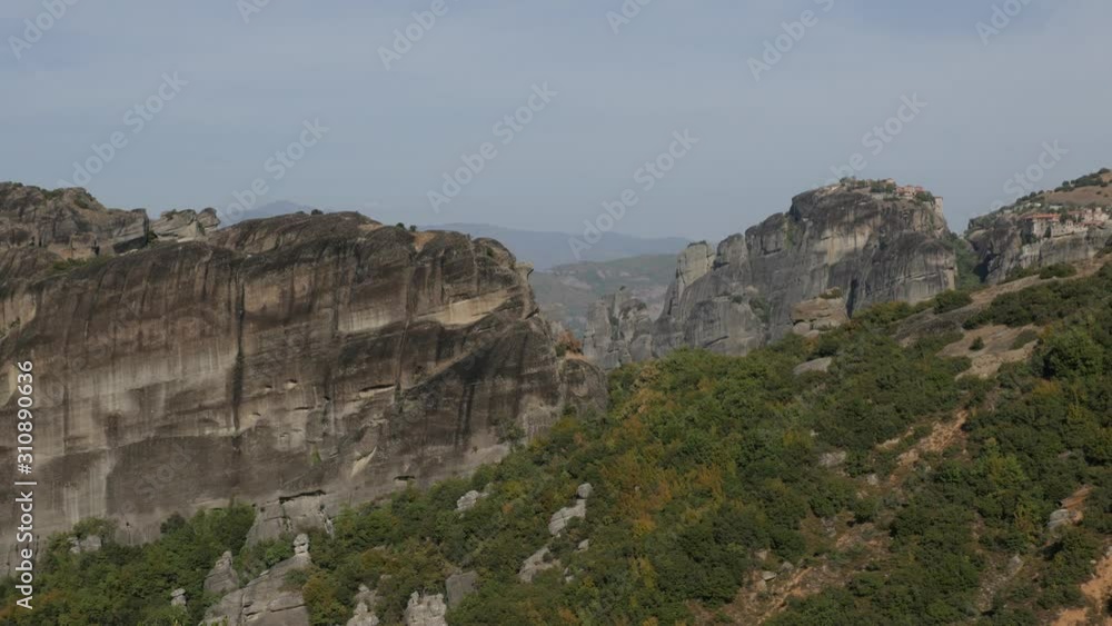 Panning on monasteries on top of the Greek Meteora rocks 4K footage