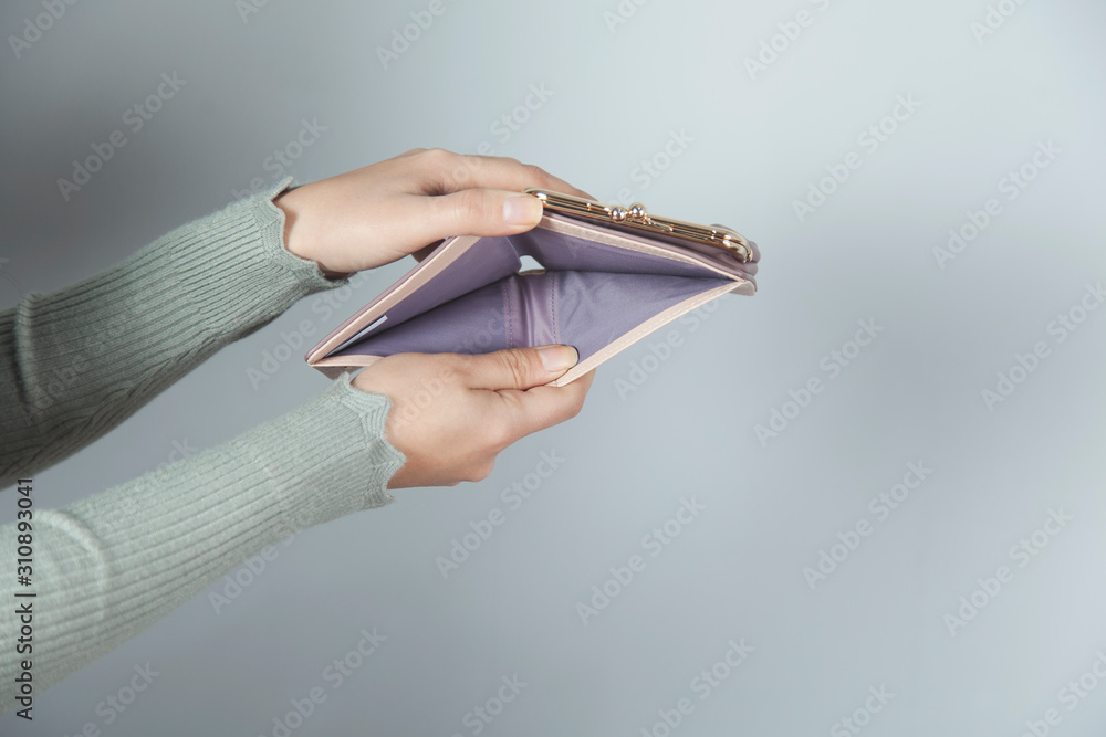 woman hand holding empty wallet