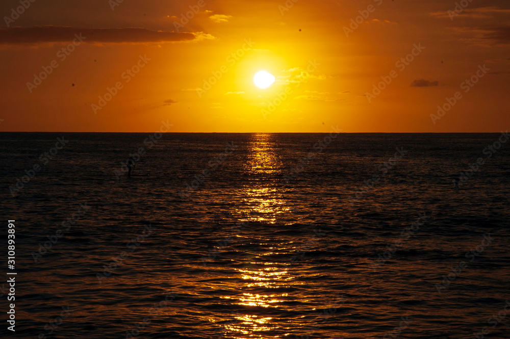 ハワイ　南国　海　ビーチ　夕日　サンセット　オレンジ