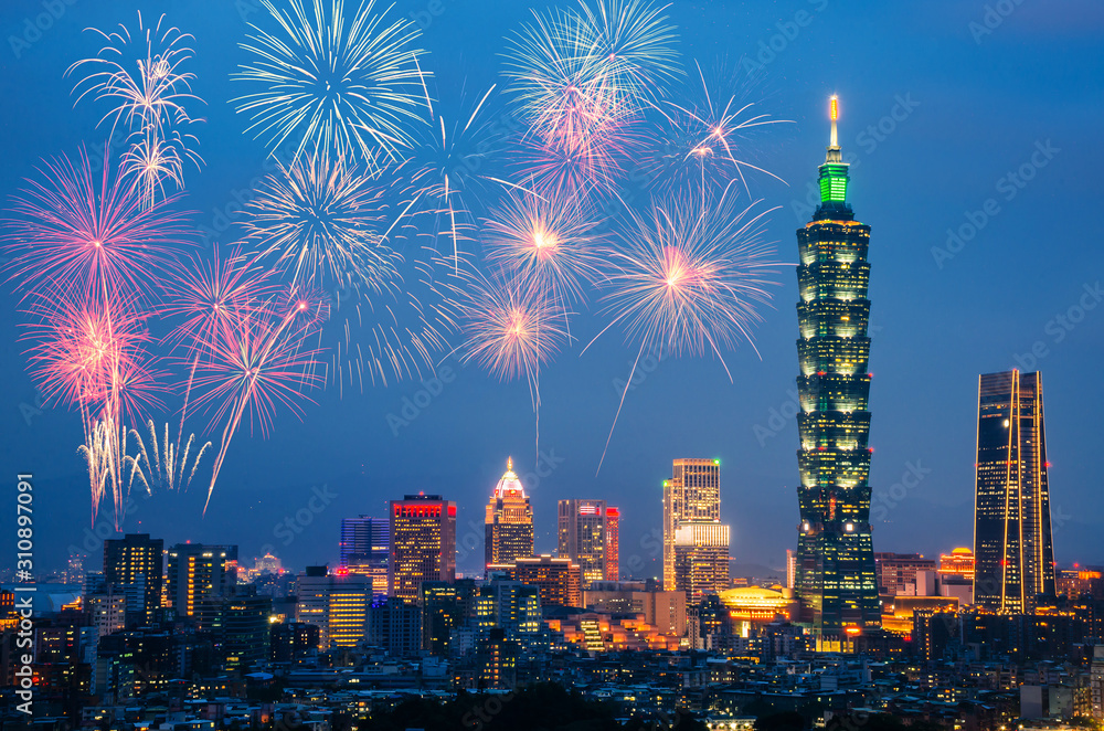 Naklejka premium New Year colorful fireworks with cityscape taipei skyline in night time,Taiwan