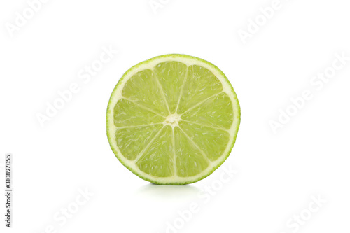 Half of juicy ripe lime isolated on white background