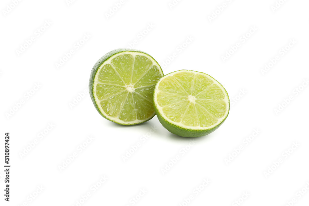 Juicy lime halves isolated on white background