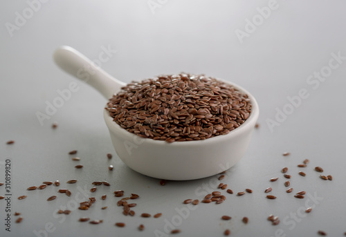 flax seeds in a small cup