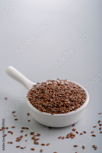 flax seeds in a small cup