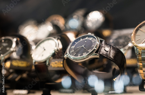 Luxurious Watches In A Store Stand