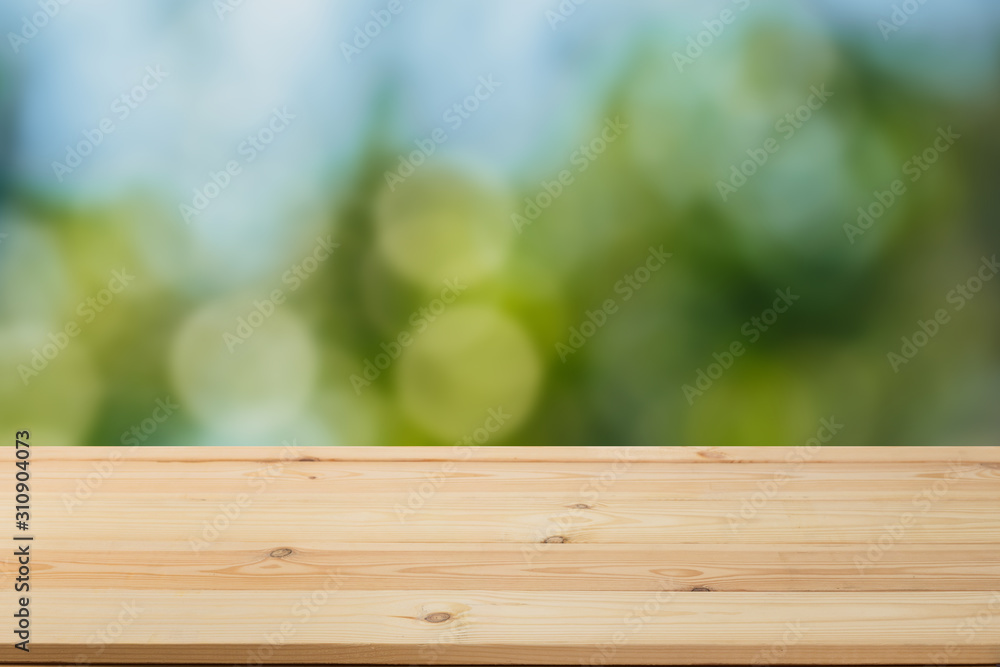 Wooden table in front of a blurred background. Perspective brown wood with blurry grunge or old wall backdrop - can be used to showcase or mount your products. Mock up to display the product. Wooden table in front of a blurred background. Perspective brown wood with blurry grunge or old wall backdrop - can be used to showcase or mount your products. Mock up to display the product.