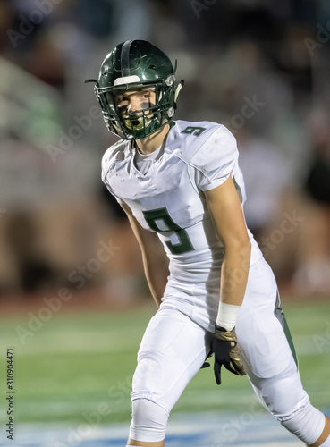 Football player in action during a game in South Texas
