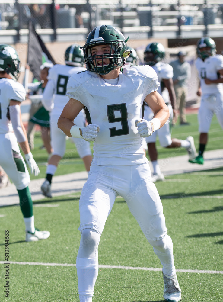 Fototapeta premium Football player in action during a game in South Texas