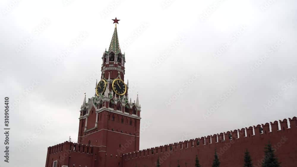 The tower of the Moscow Kremlin against the gray sky. The tower of the Moscow Kremlin against the gray sky.