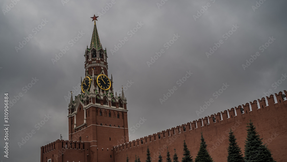 The tower of the Moscow Kremlin against the gray sky. The tower of the Moscow Kremlin against the gray sky.