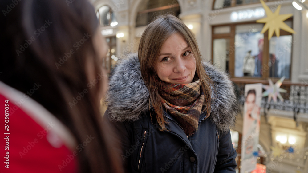 custom made wallpaper toronto digitalThe meeting of the girlfriends. Two women are discussing something in a shopping center.