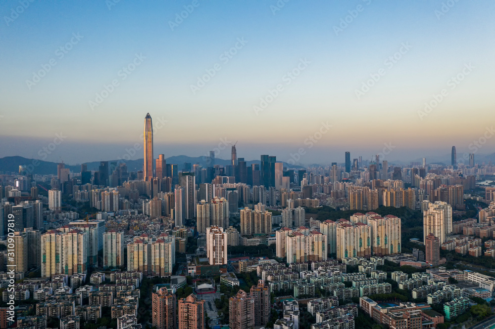 an aerial view of shenzhen city skyline at dusk moment in winter