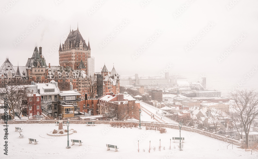 Fototapeta premium Cityscape of old Town of Quebec, Canada, in winter time. Can see the Chateau Frontenac with snow