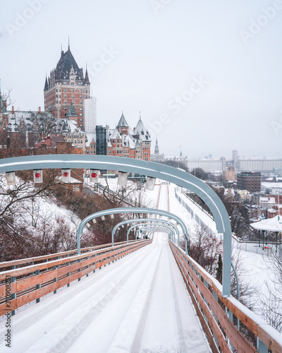 Toboggan slide in Old town of Quebec Canada. Can see the Chateau frontenac in background  photo