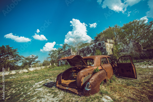 abandoned car backl shot photo