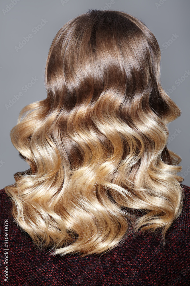 Beautiful and Shiny Curly Hair. Fashion Girl With Healthy Long Wavy Hair. Beauty Blonde Woman Back View. Retro Beautiful and Shiny Curly Hair. Fashion Girl With Healthy Long Wavy Hair. Beauty Blonde Woman Back View. Retro